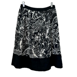 Cagliari Exchange black and cream floral midi silk skirt. Size 8-10 (28” waist)